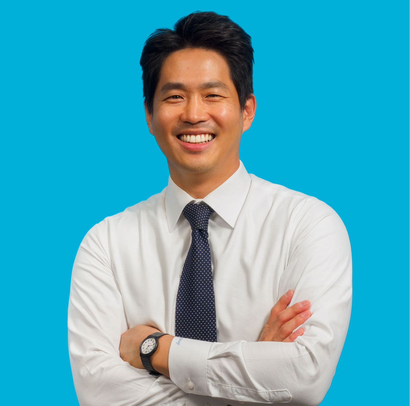Sky Dental Endodontic Specialist, Dr. James Yang, arms folded, smiling